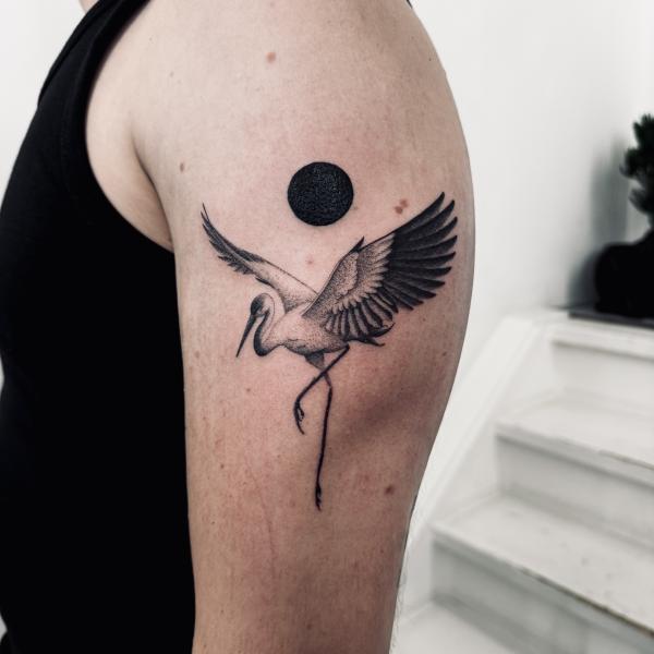 Blackwork Crane Tattoo