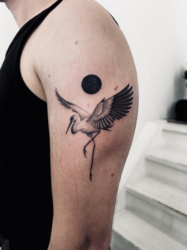 Blackwork Crane Tattoo