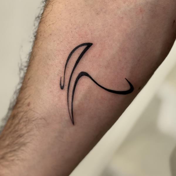 Fineline Abstract Pickaxe Tattoo