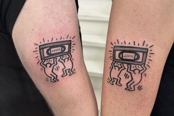 Fineline Keith Haring Tattoo