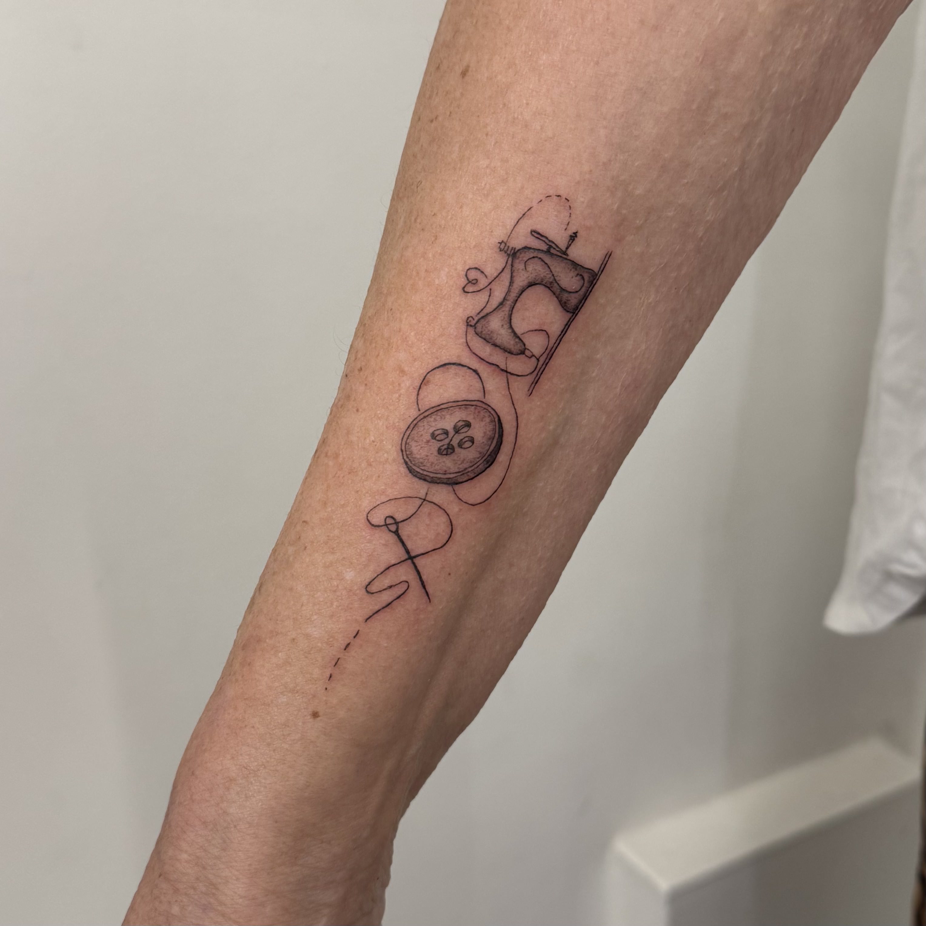 Fineline Sowing Tattoo