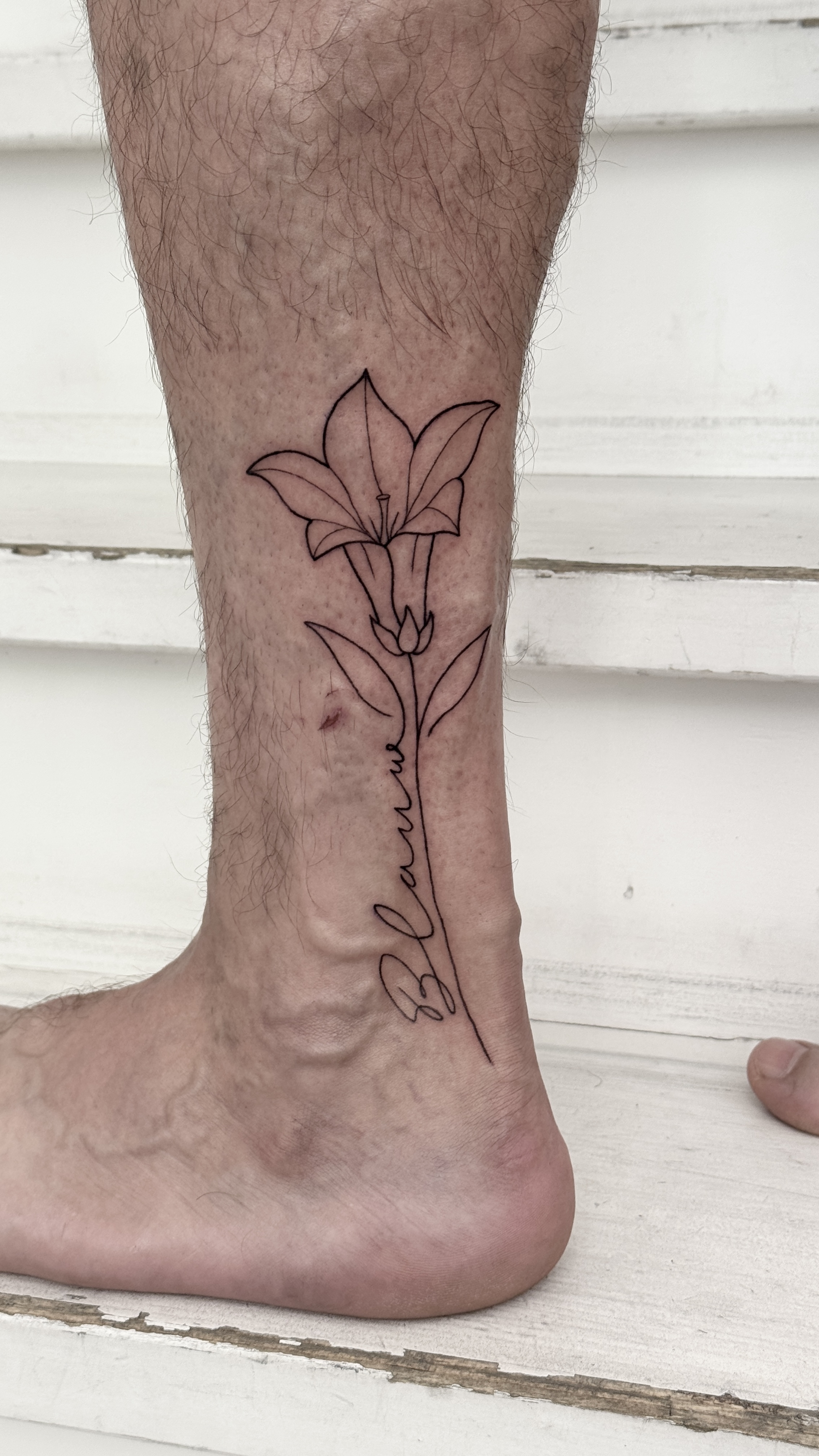 Fineline Tattoo flower with script